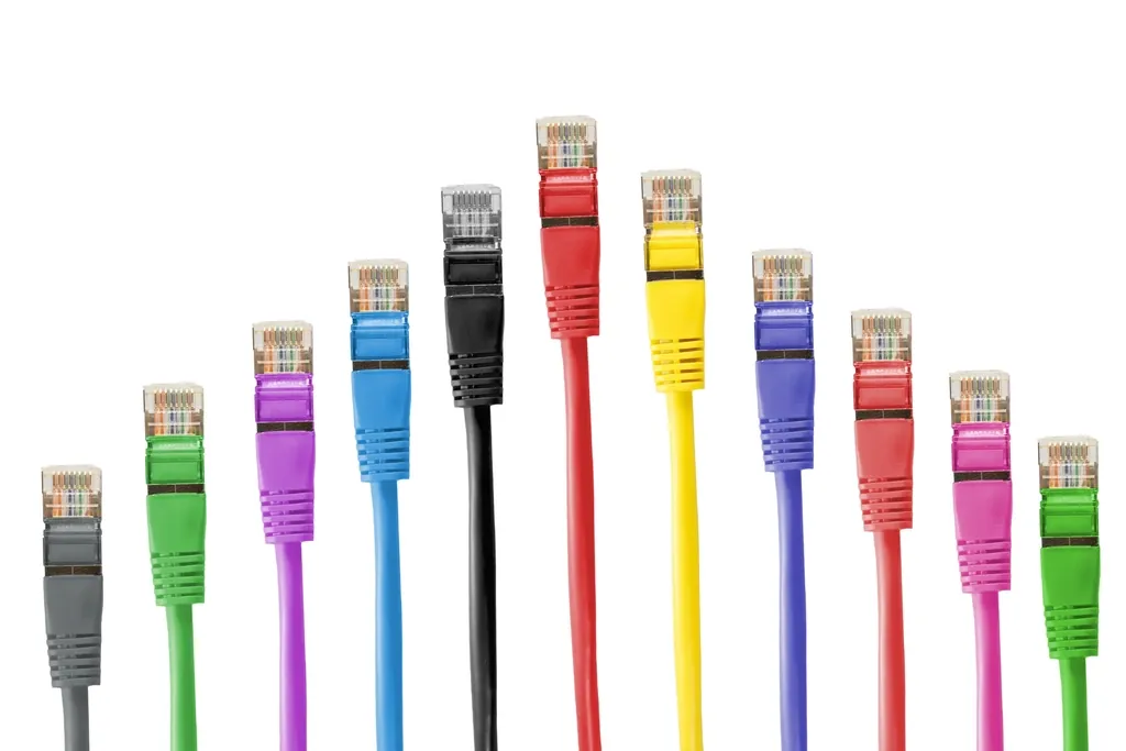 Row of colourful network plugs standing upright, each a different way to connect