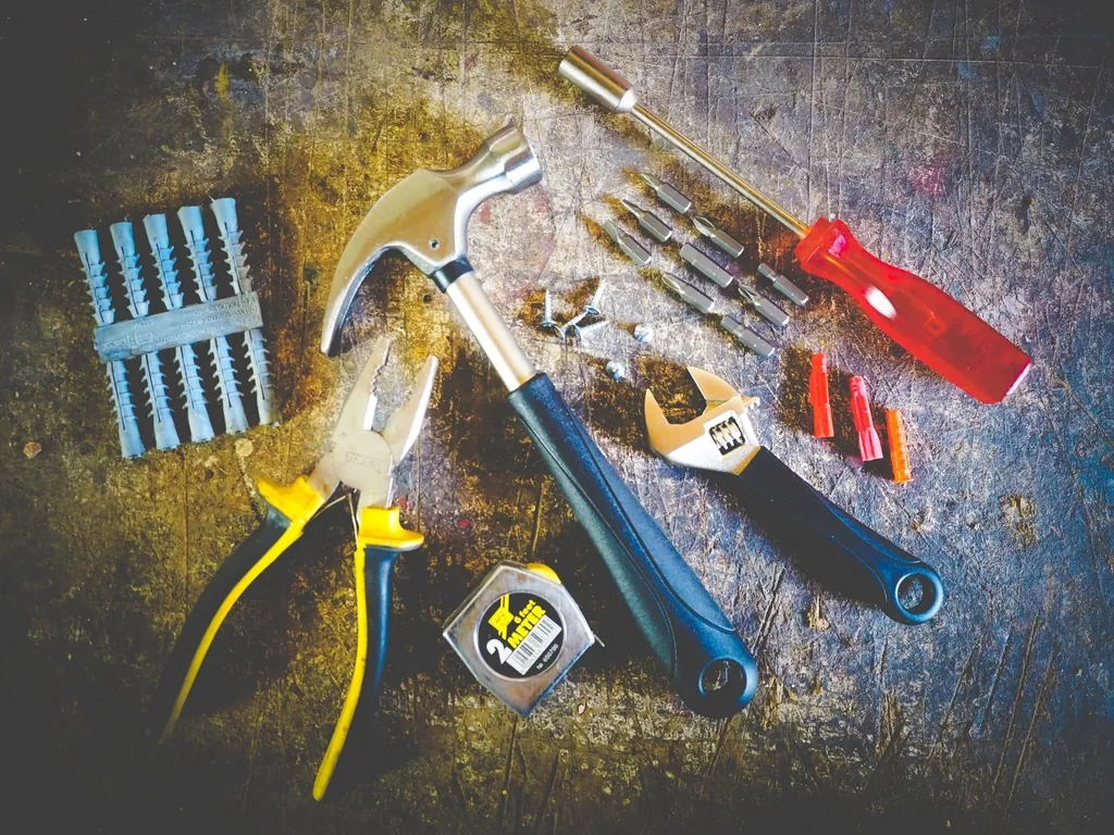 Hand tools laid out on a work surface, each suited to a different job