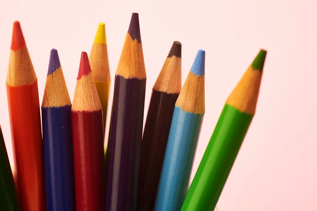 Coloured pencils standing in a row, like a palette of design tokens defined in CSS