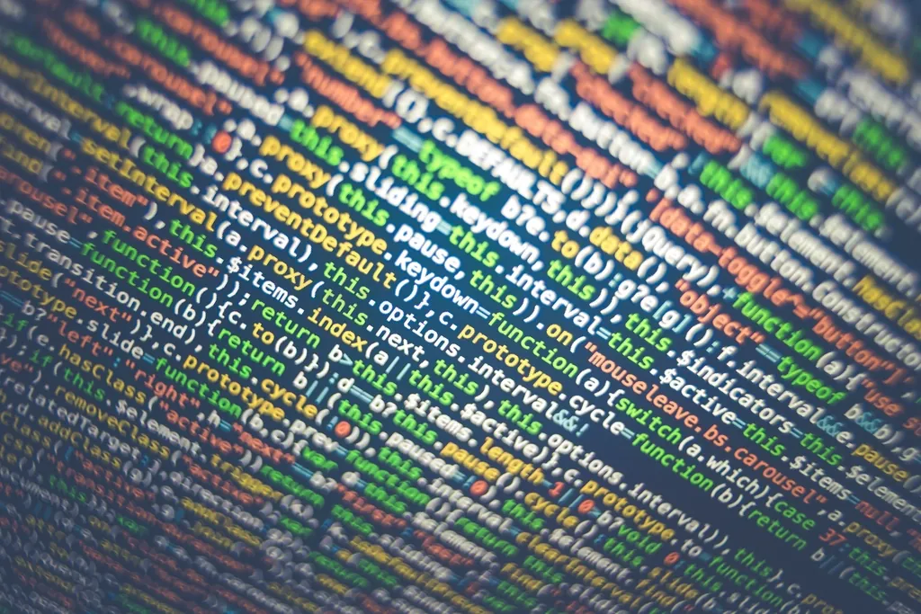 Close-up of colourful lines of code, the kind of small typed API a Worker serves