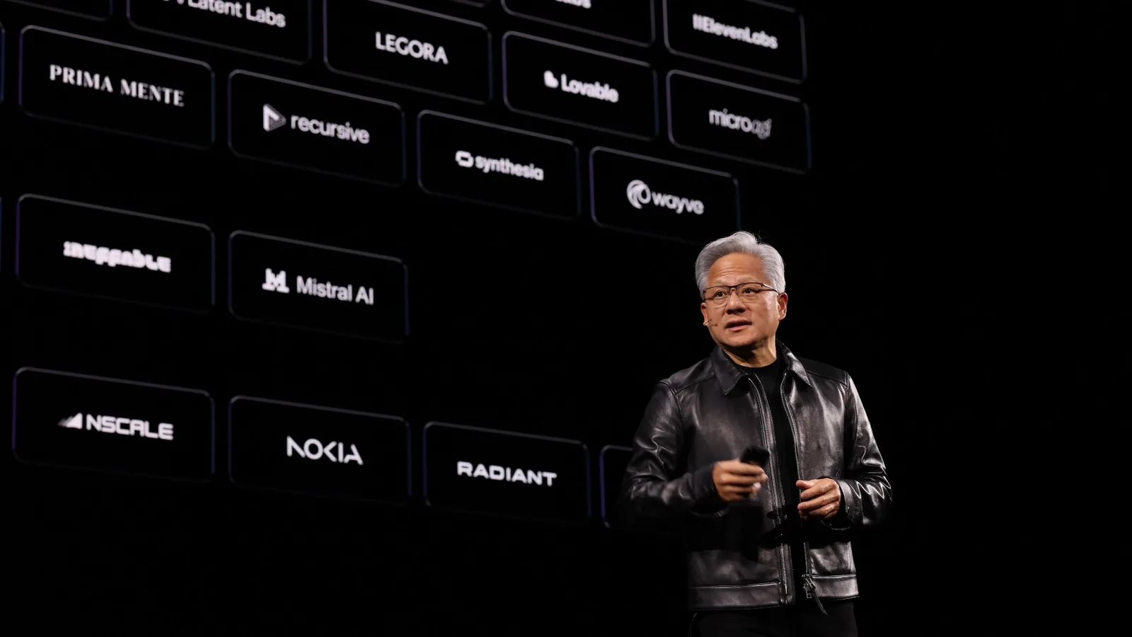 Jensen Huang on stage at Nvidia GTC Berlin 2026 in front of logos of European AI companies including Mistral AI, Nscale and Nokia